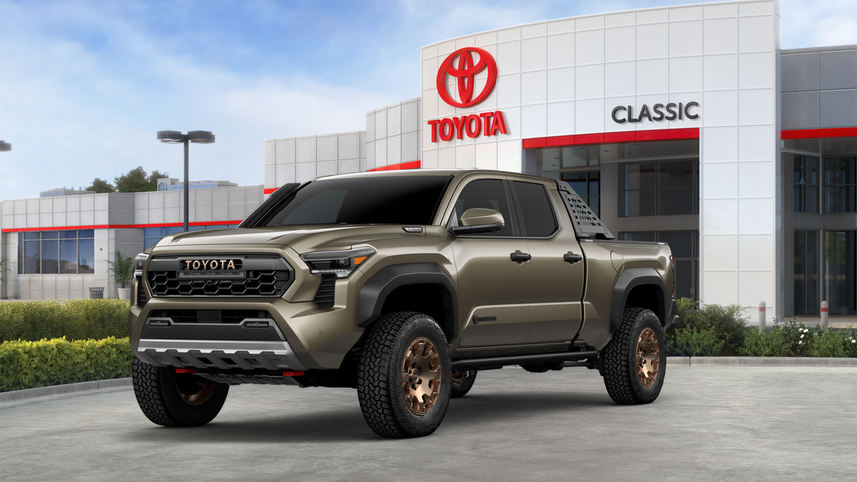 2026 Toyota Tacoma i-FORCE MAX Tacoma Trailhunter in Bronze Oxide — front three-quarter view