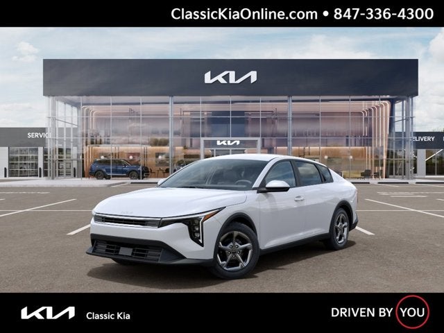 2026 Kia K4 LXS in Snow White Pearl — front three-quarter view
