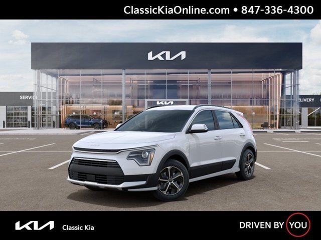 2026 Kia Niro EX in Snow White Pearl — front three-quarter view