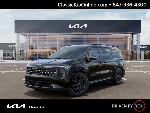 2026 Kia Carnival SX Prestige in Aurora Black Pearl — front three-quarter view